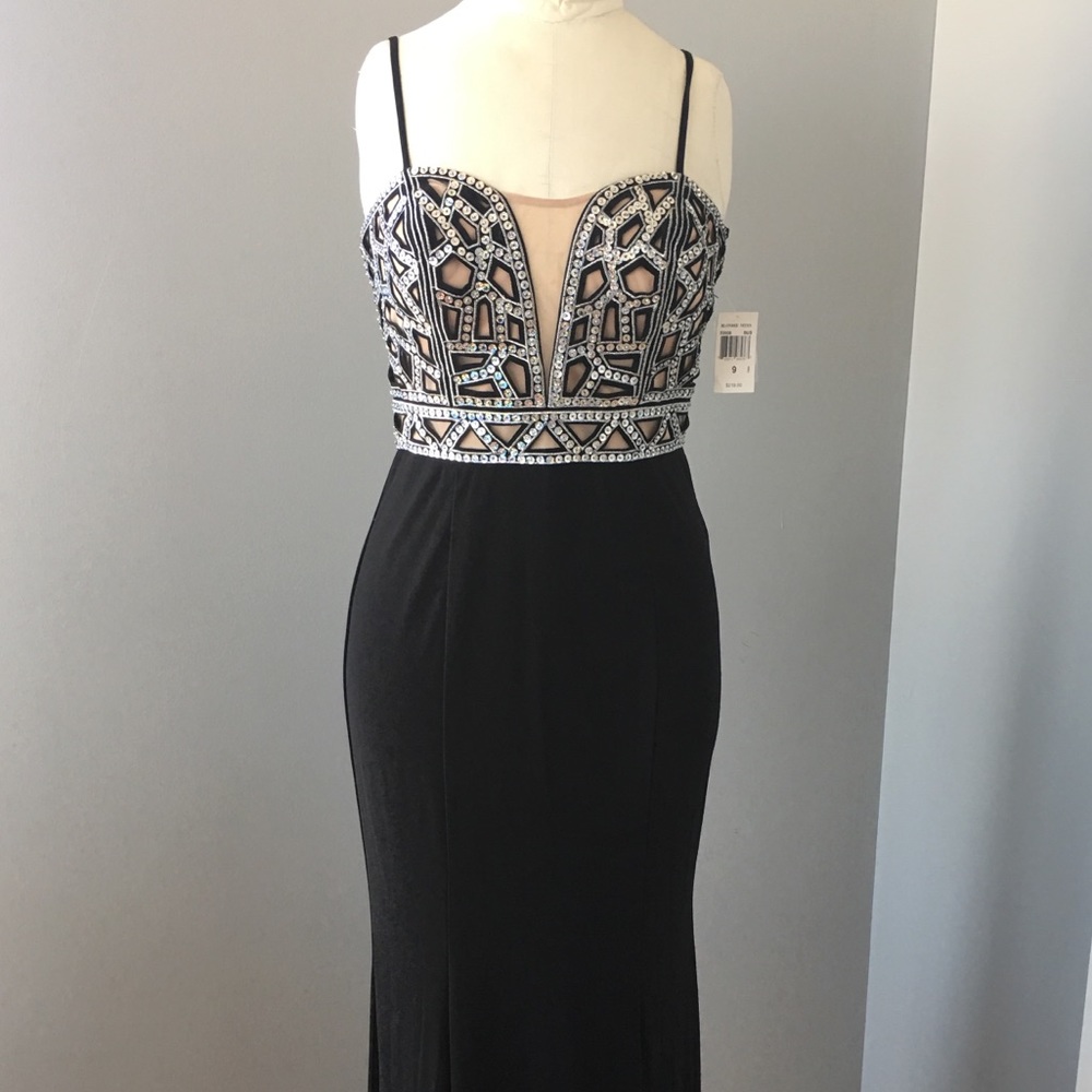 Beaded/illusion bodice gown.